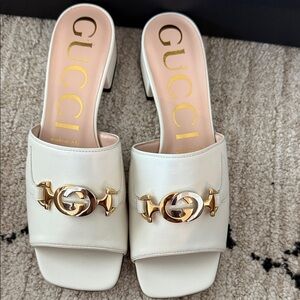 Gucci Women's Cream Mules with Gold Accents